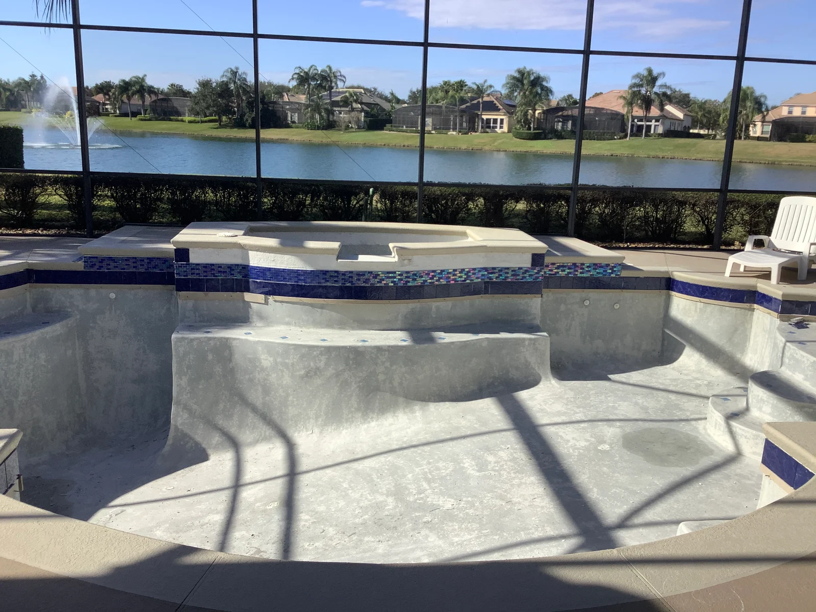 Lakeside pool transformation before